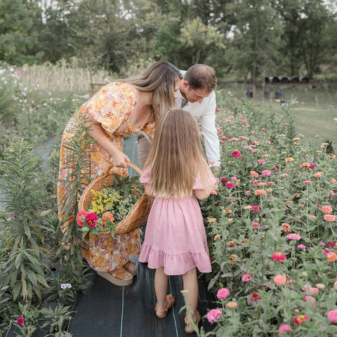 Professional family photography with a flower farm backdrop
