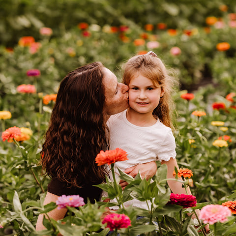 Family Photos in flowers First Roots Farm near Waukesha WI