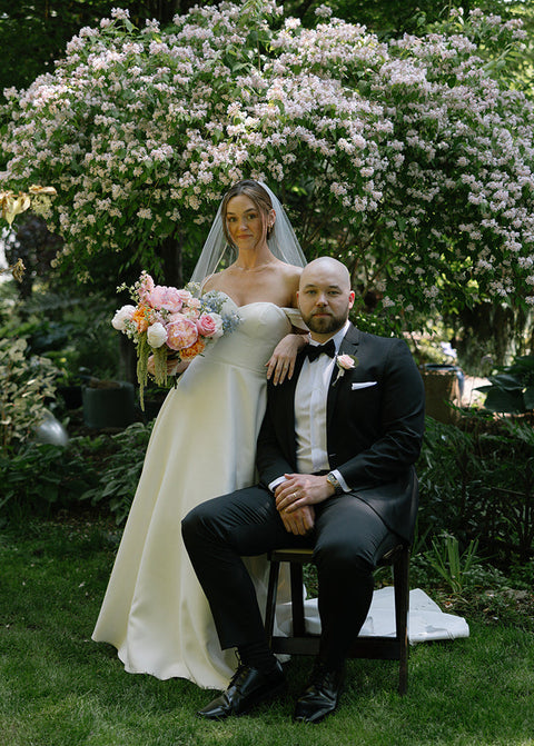 Bride and Groom with bridal bouquet from Florist First Roots Farm at Sanger House Gardens.
