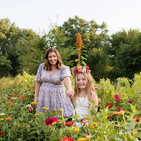 summer girls night ideas Wisconsin Mother and daughter making flower crowns together at First Roots Farm flower workshop in Wisconsin.