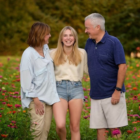 Senior portraits in a flower field at First Roots Farm in Oconomowoc, WI. Flower farm photo sessions with CHRISTINE PLAMANN Photography