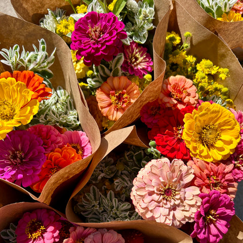 Bouquet of colorful flowers with brown paper wrapping