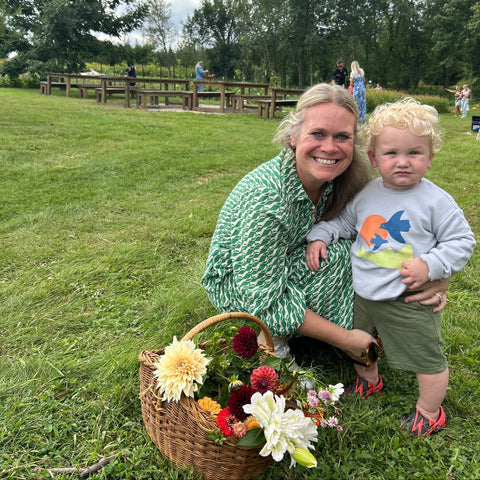 Family-friendly summer activity near Milwaukee with Story Time and flowers.
